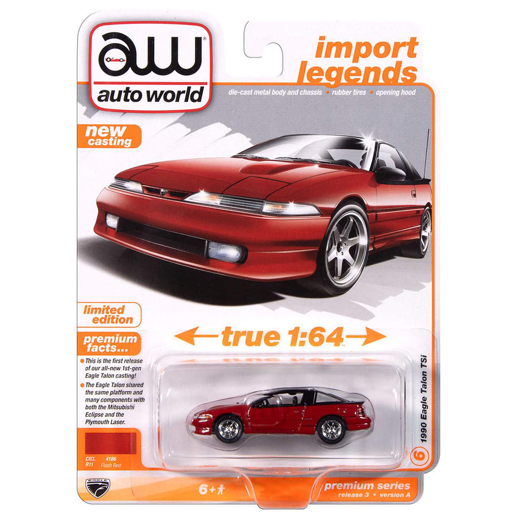 Red car model in packaging with 'auto world' branding