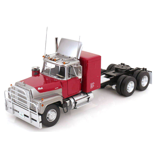 Model of a red and silver Mack R Model truck on a white background