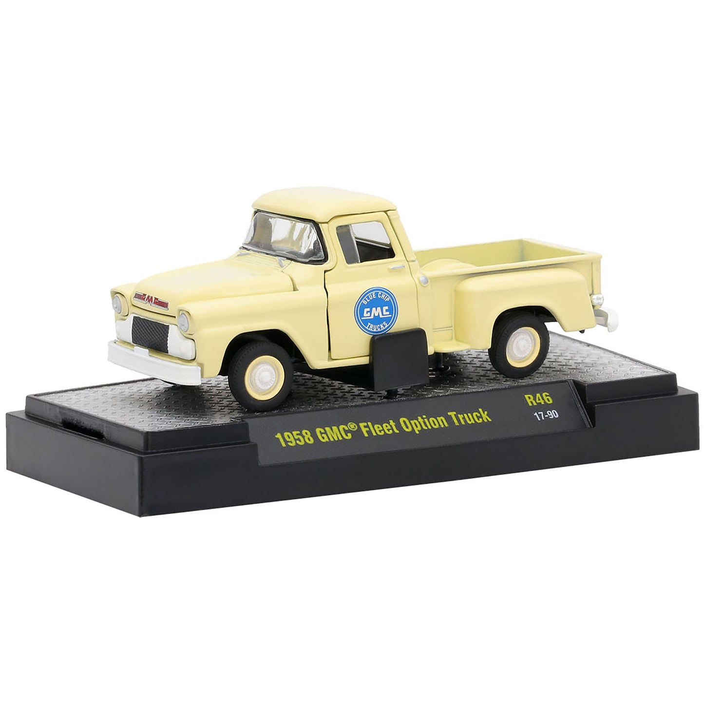 Model of a 1952 GMC Fleet Option truck on a display stand with a white background