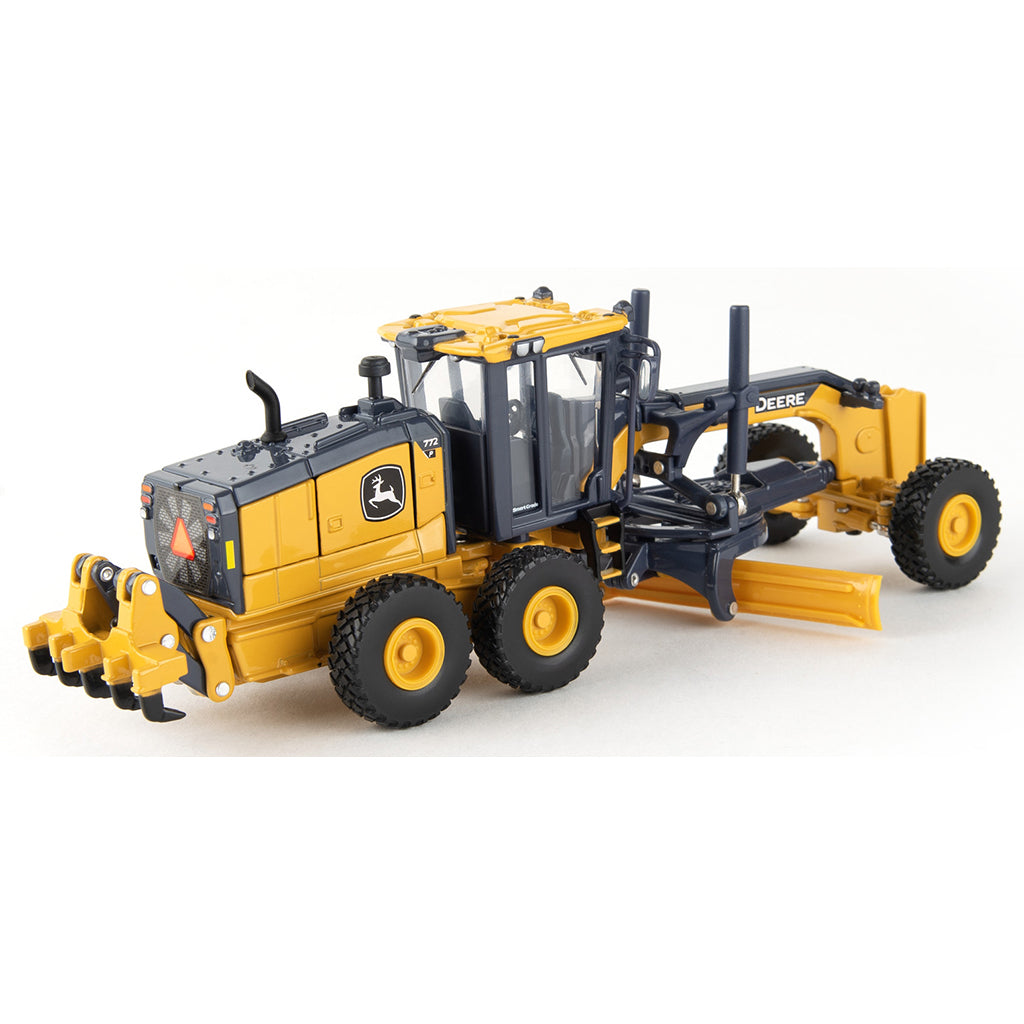 John Deere 772 P-Tier Motor Grader on a white background