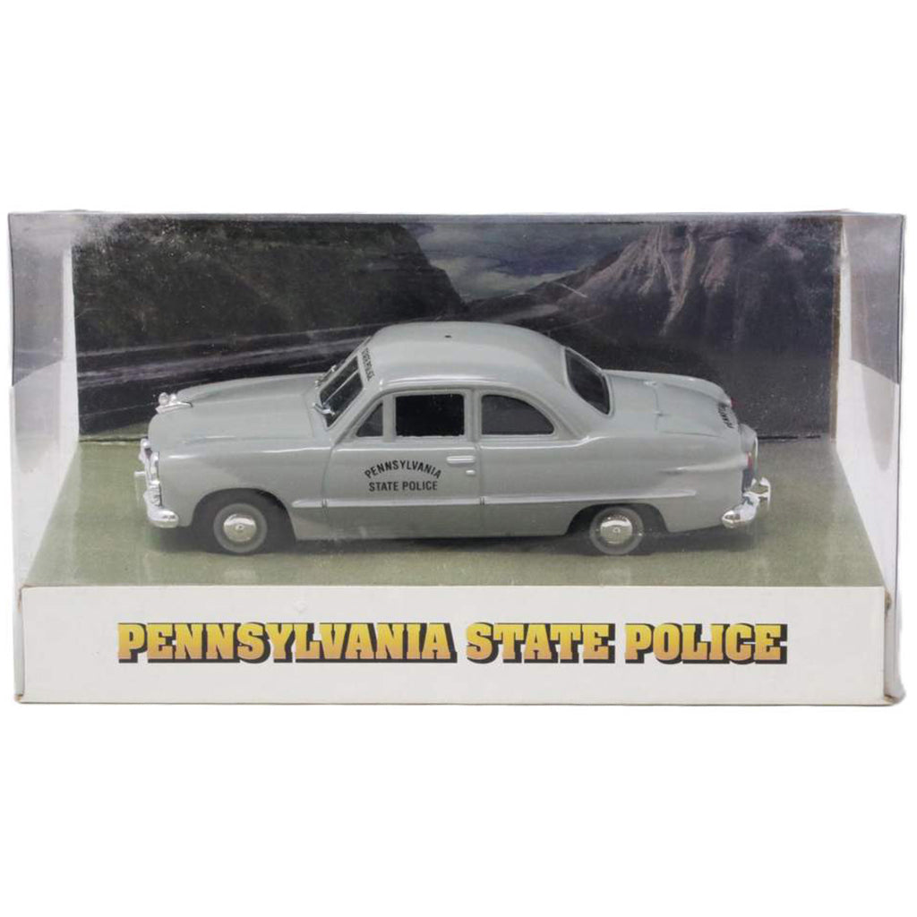 Model of a Pennsylvania State Police car in a box with a scenic background