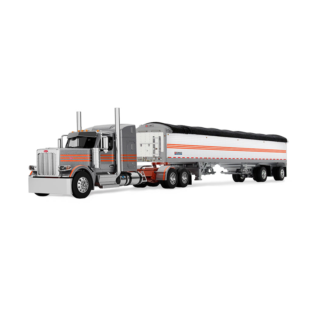 A diecast model of a Peterbilt semi-truck pulling a white grain trailer with orange stripes and a black tarp, on a white background.