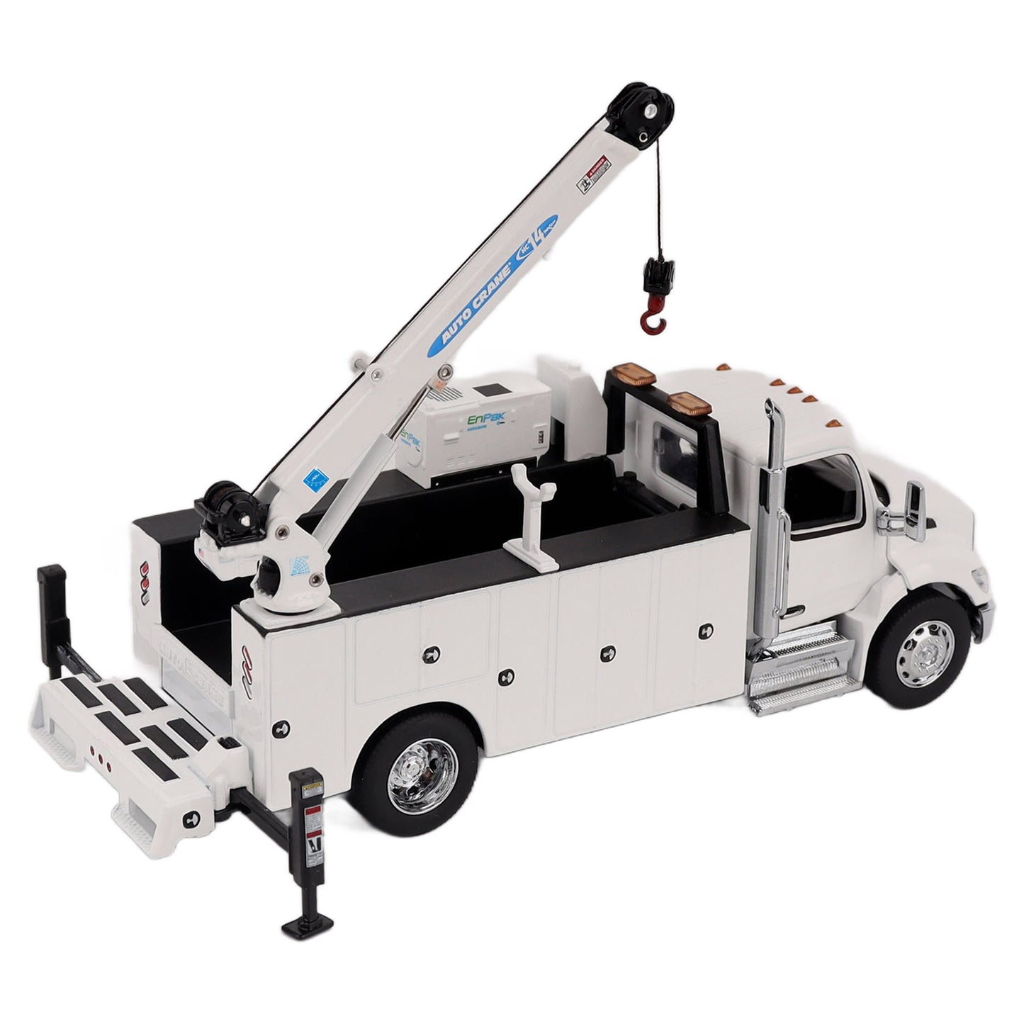 A White Diecast Model of a Peterbilt Model 536 Service Truck on a White Background