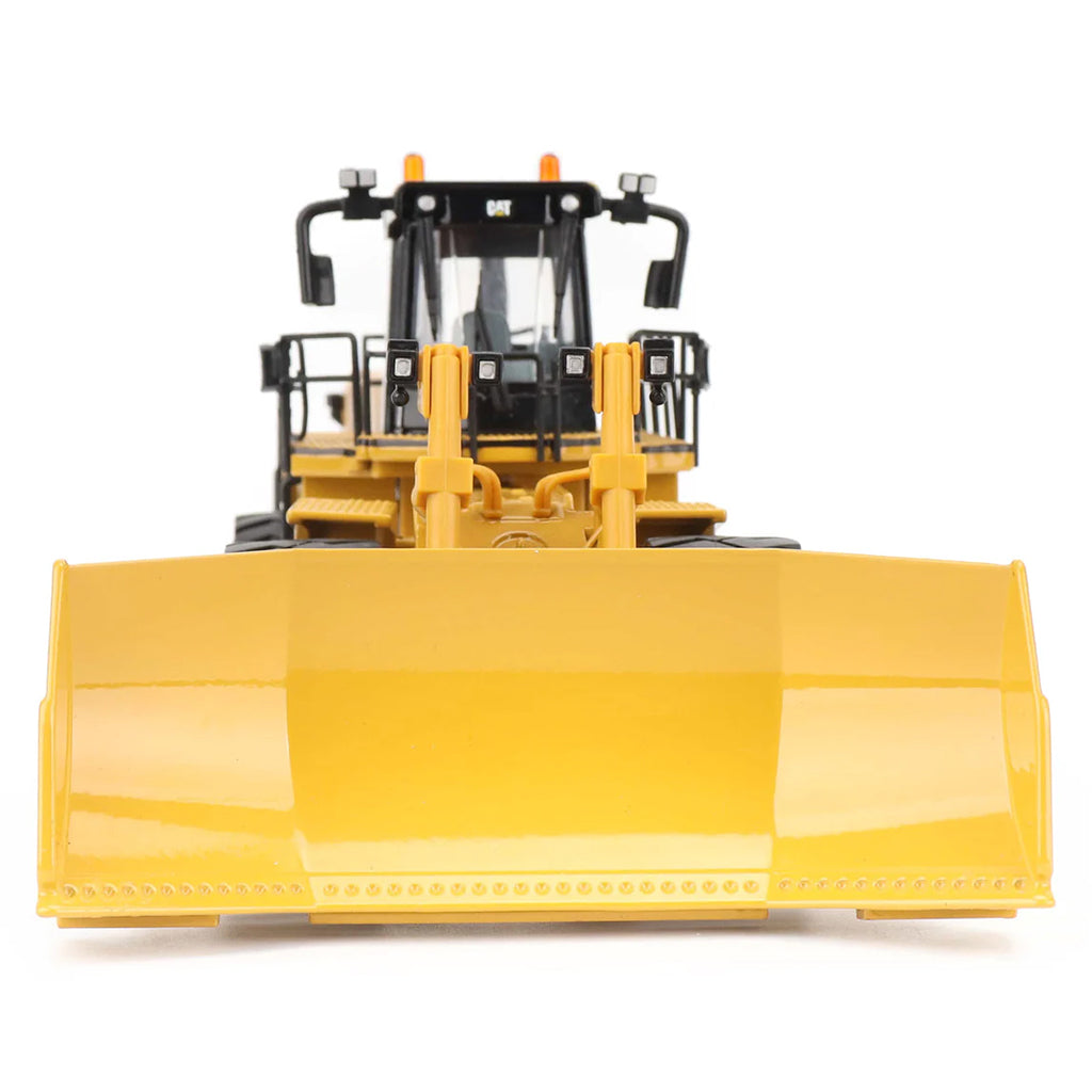 Model of a Caterpillar 854K Wheel Dozer on a White Background