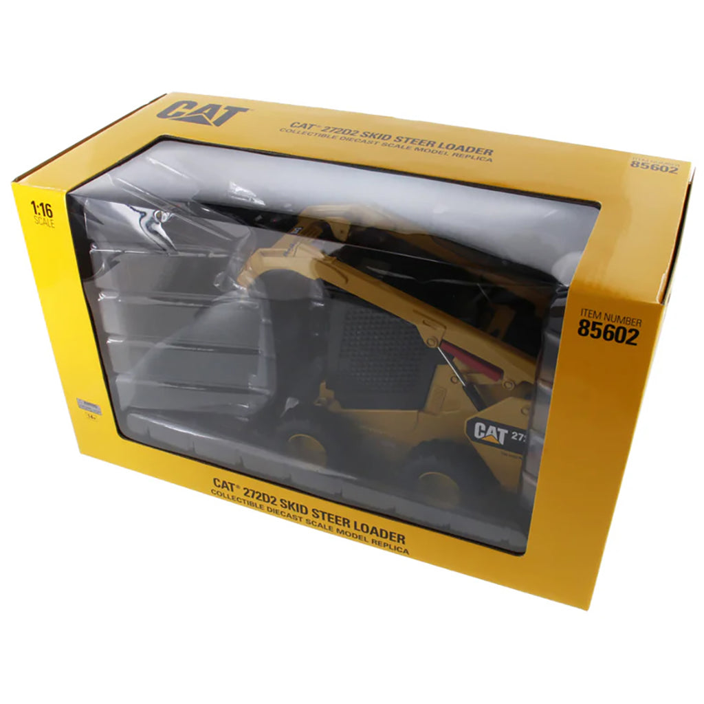 Model of a Cat 272D2 Skid Steer Loader in a yellow window box packaging on a white background