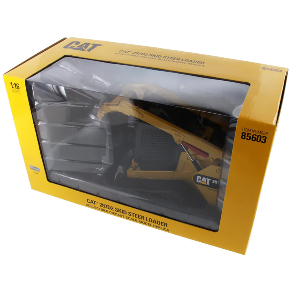 Model compact track loader in packaging with 'Cat' branding on a white background