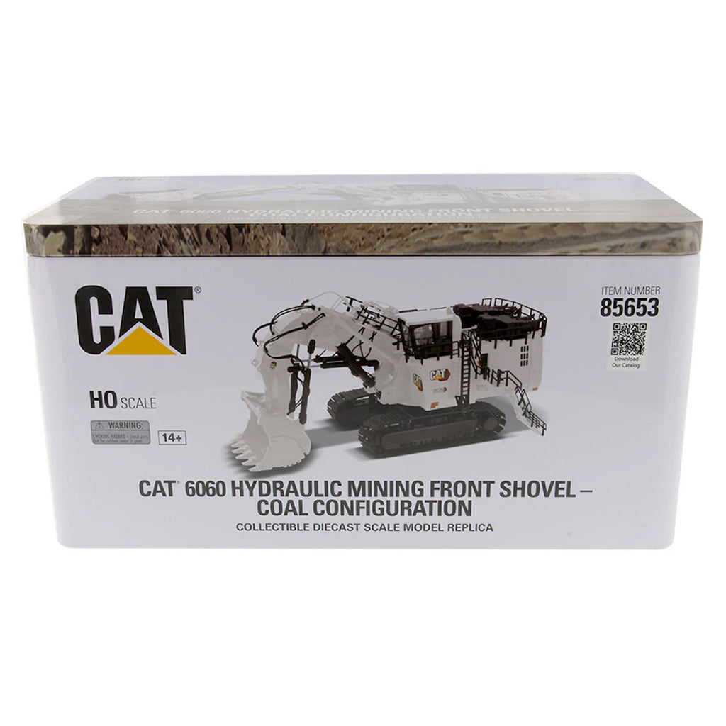 Model of a Caterpillar 6060F Front Shovel Mining Excavator in a Coal Configuration Painted White in a Tin Box Packaging on a White Background