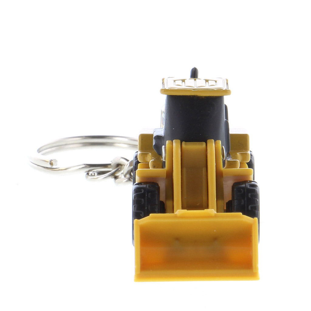 A miniature yellow and black toy wheel loader keychain with a metal key ring attached, shown on a plain white background.