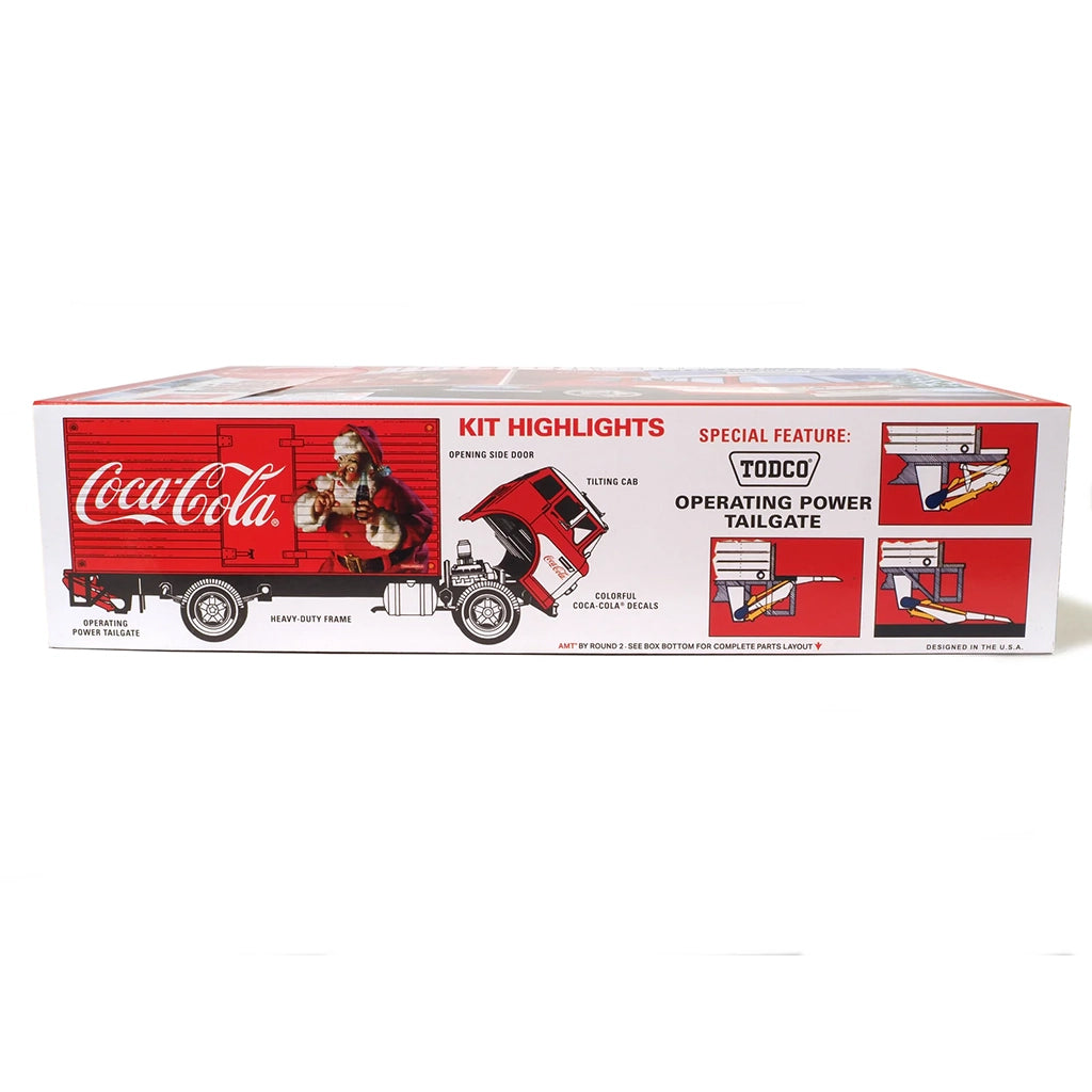 Model truck kit box with Coca-Cola branding on a white background