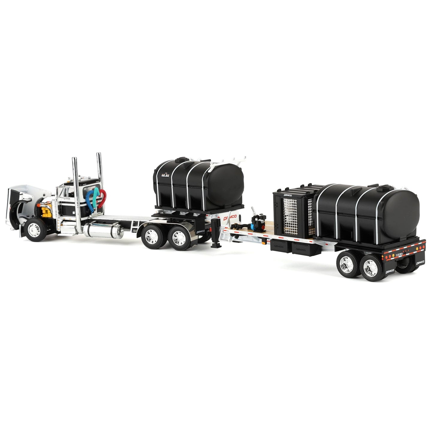Model truck with a large trailer on a white background