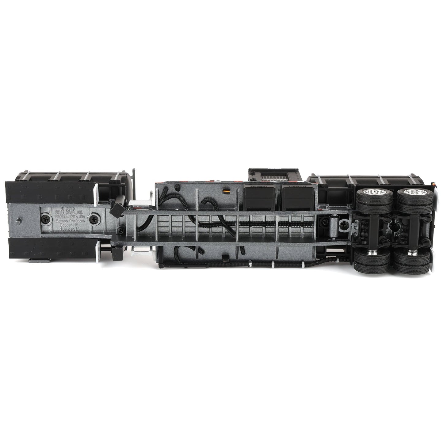 Black mechanical component on a white background