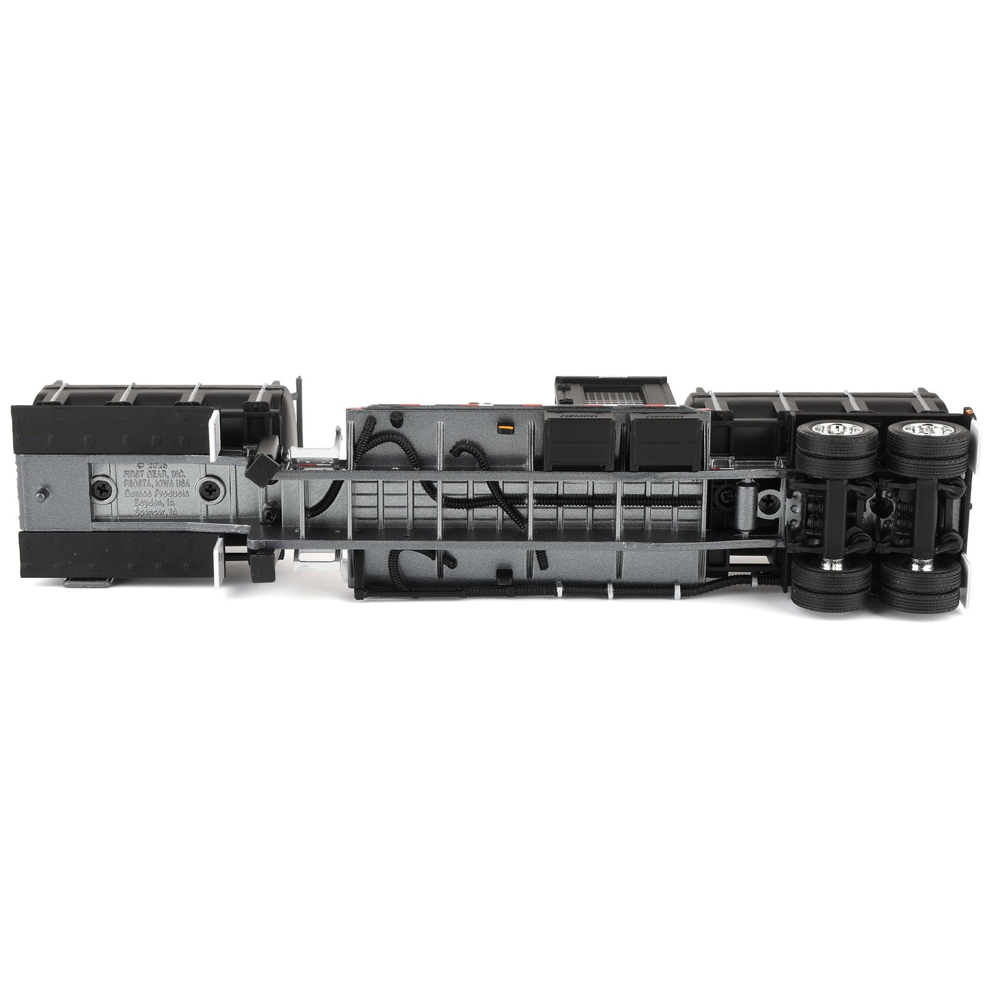 Black mechanical component on a white background