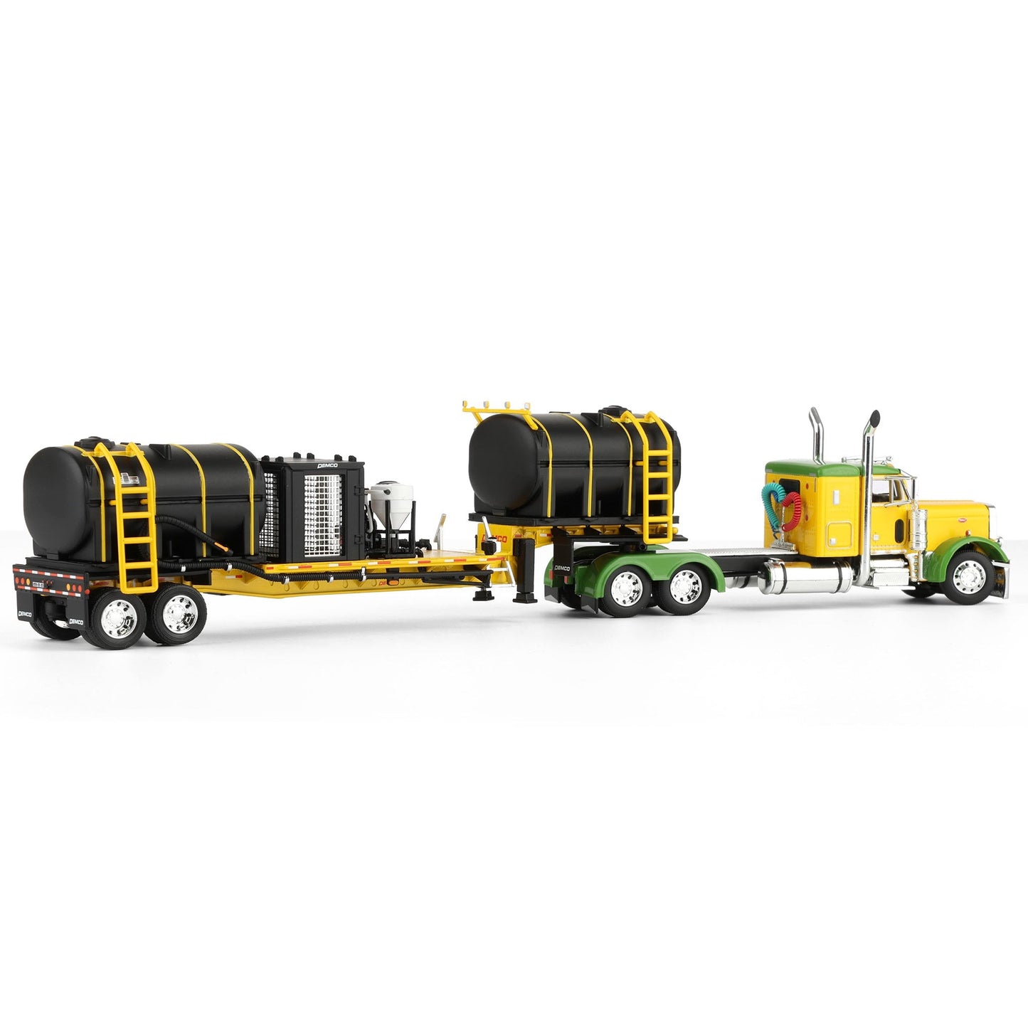 Model of a yellow and green truck with black tanker trailers on a white background