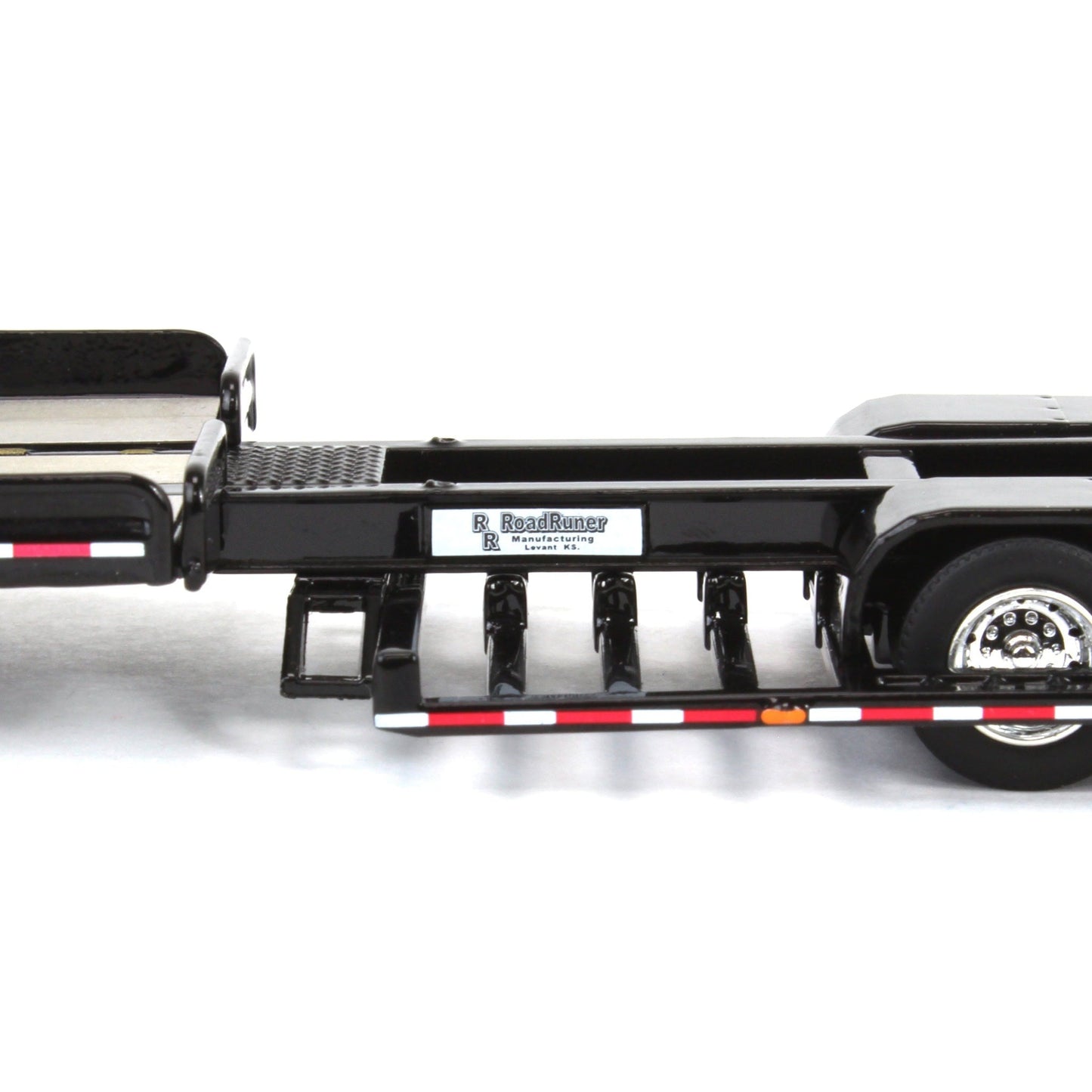 Black trailer with a flatbed on a white background