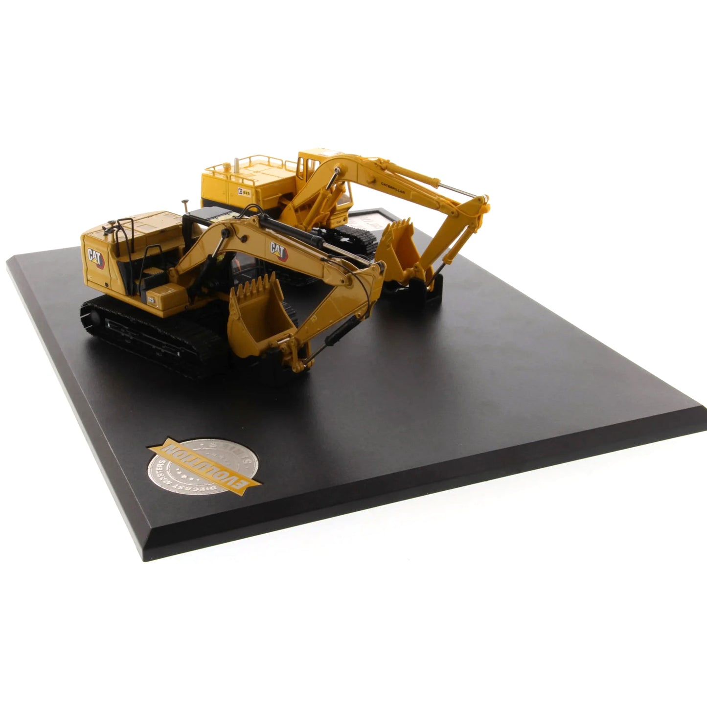 Model of a yellow excavator on a black platform with a white background