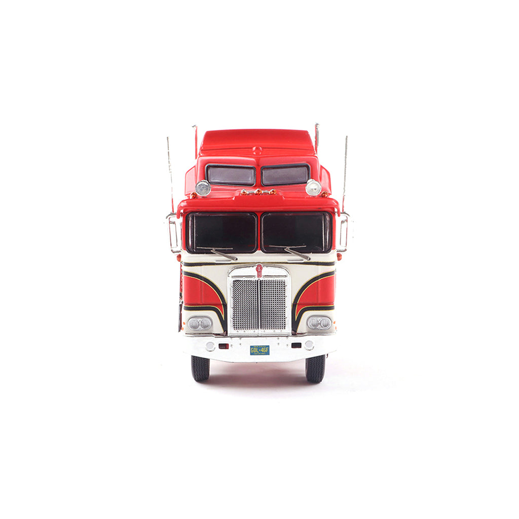 Model of a red and white Kenworth K100 Aerodyne COE truck on a white background