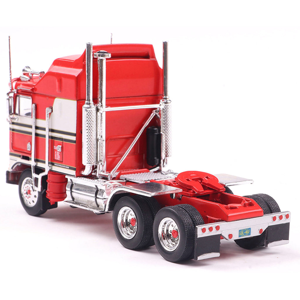 Model of a red and white Kenworth K100 Aerodyne COE truck on a white background