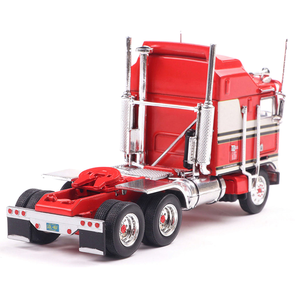 Model of a red and white Kenworth K100 Aerodyne COE truck on a white background