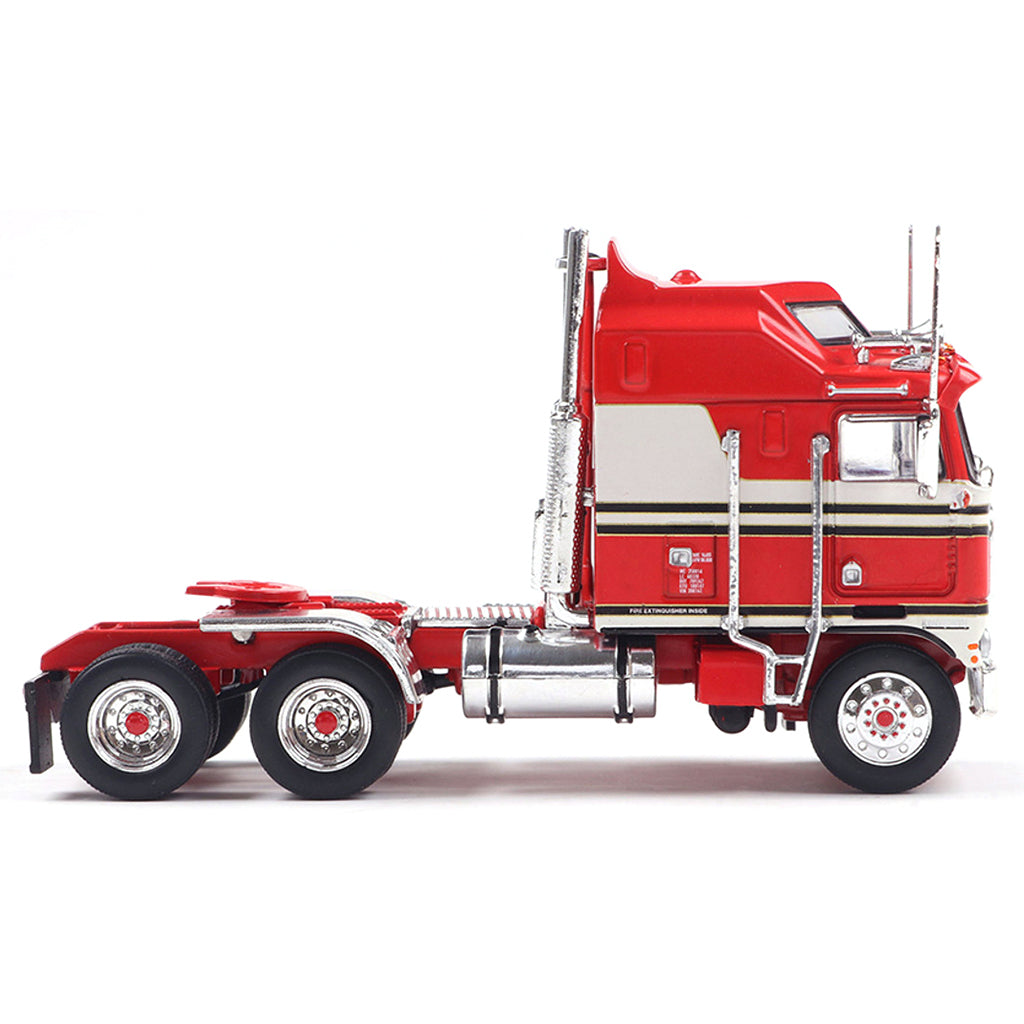 Model of a red and white Kenworth K100 Aerodyne COE truck on a white background