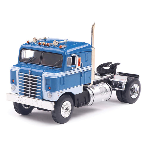 Model of a blue 1950 Kenworth 521 Bullnose truck on a white background