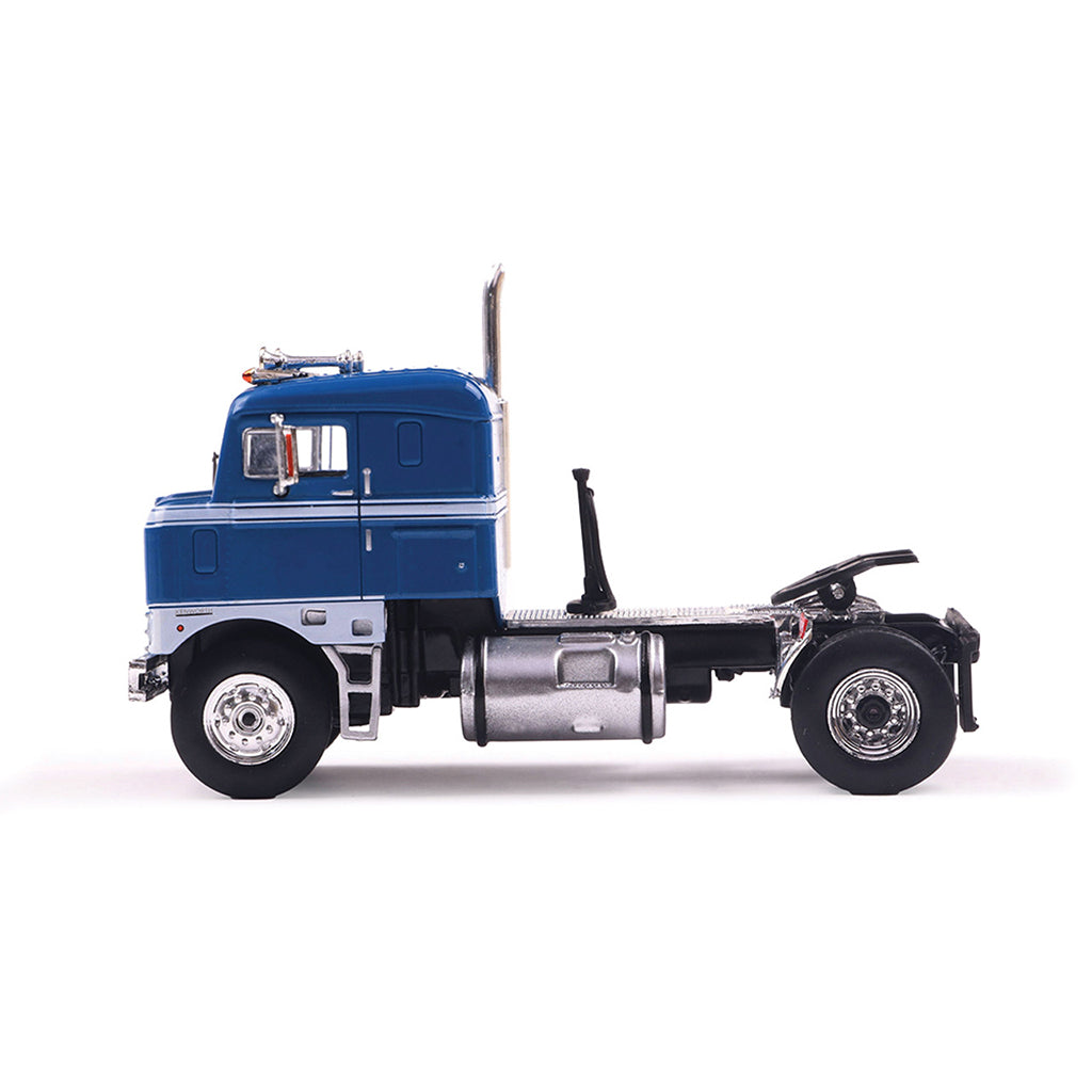 Model of a blue 1950 Kenworth 521 Bullnose truck on a white background