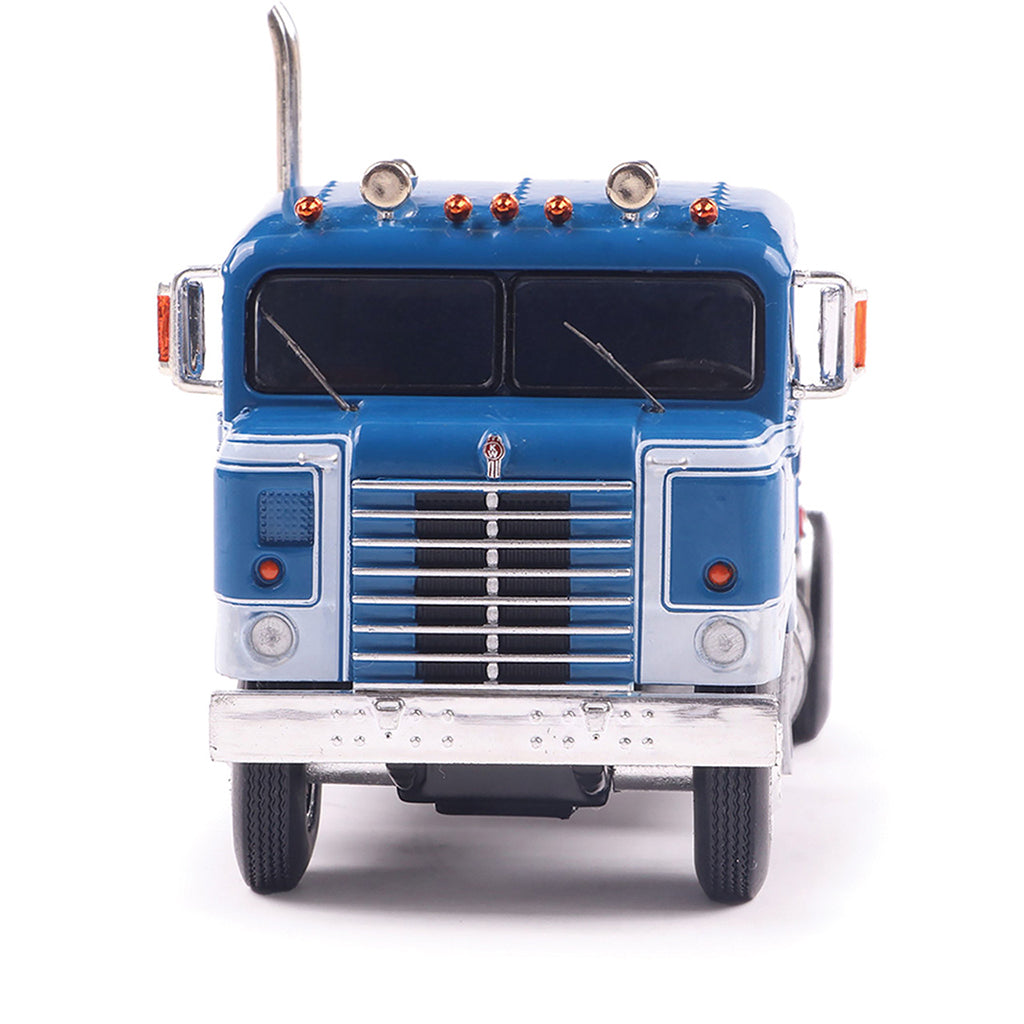 Model of a blue 1950 Kenworth 521 Bullnose truck on a white background