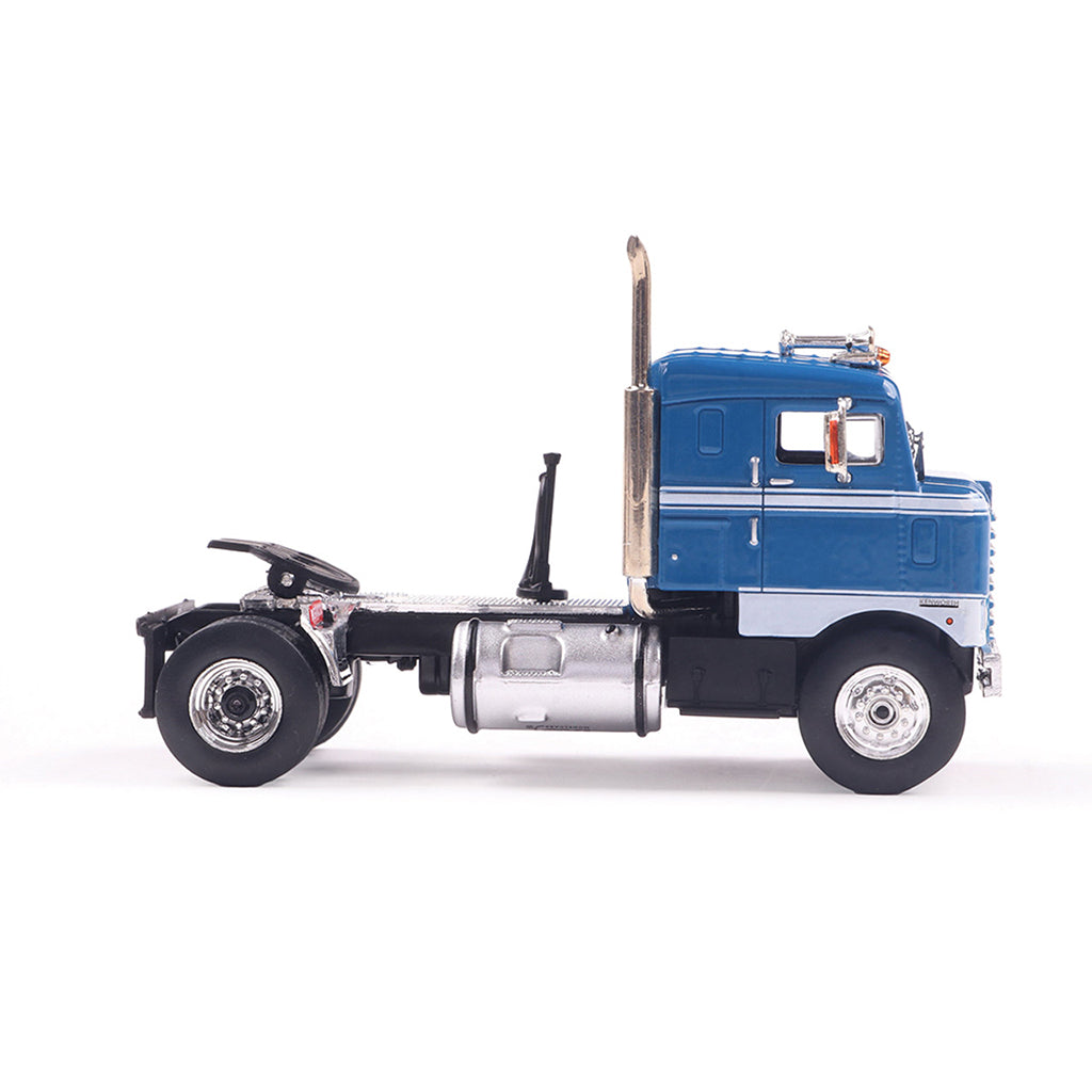 Model of a blue 1950 Kenworth 521 Bullnose truck on a white background