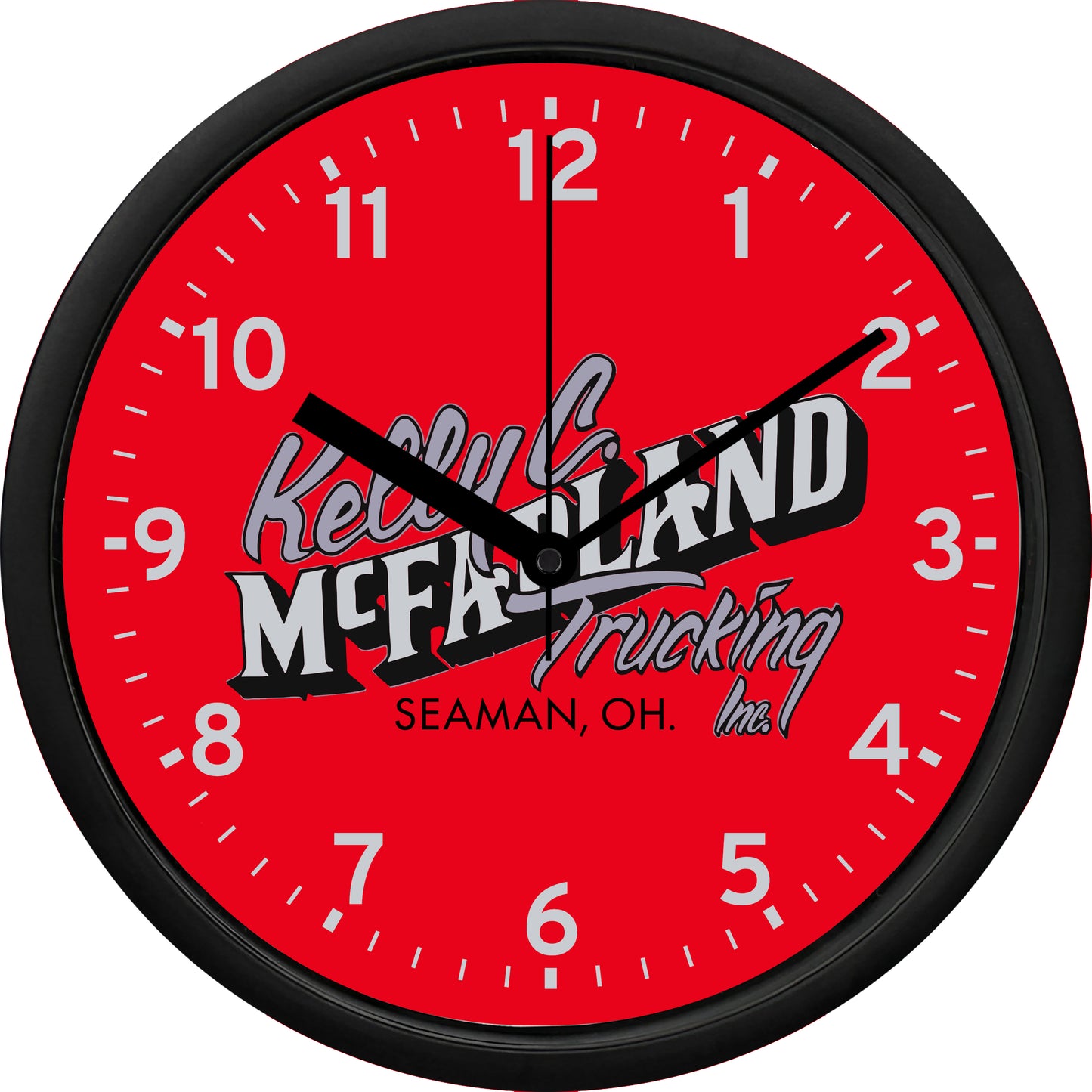 Wall clock with Kelly McFarland Trucking logo on a red background