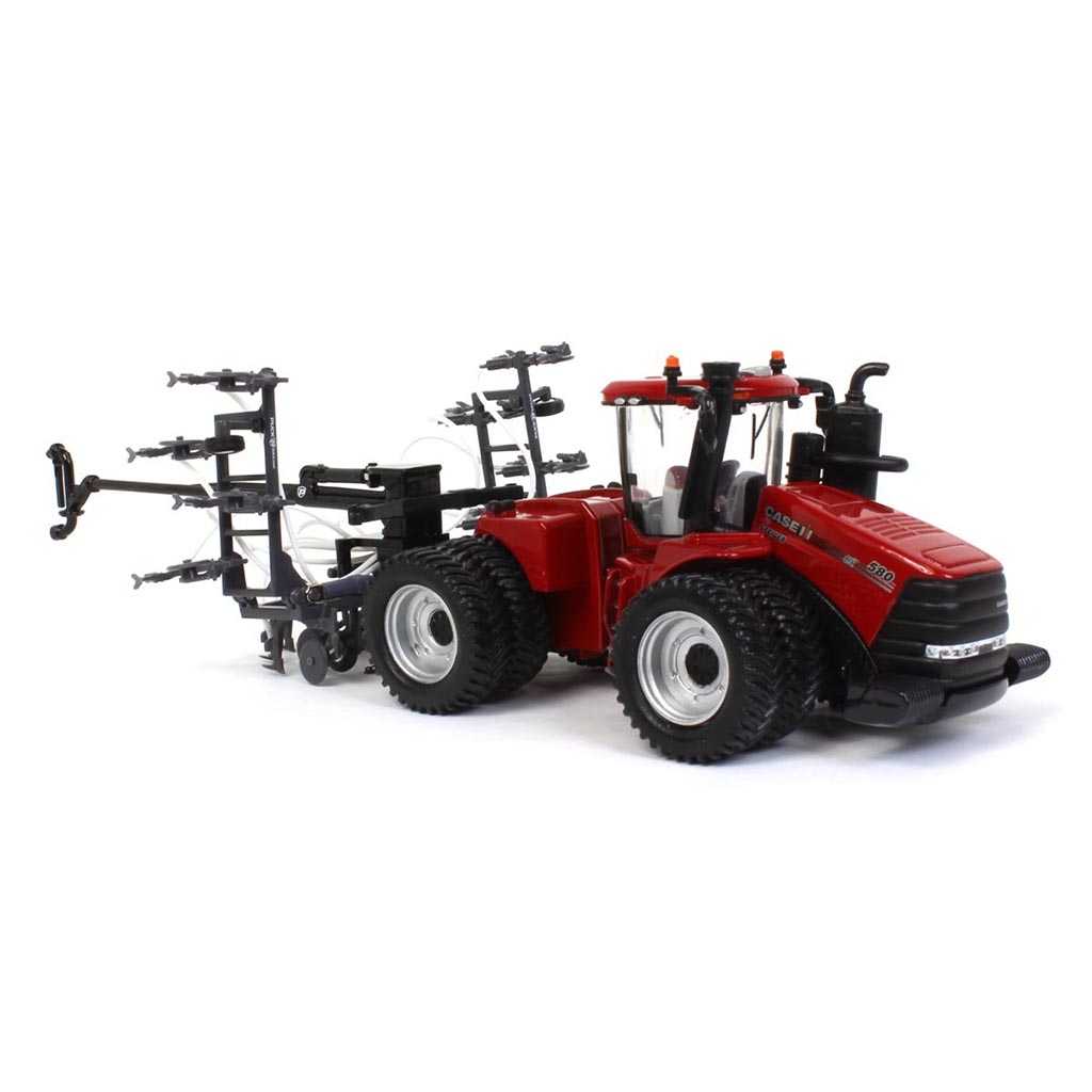 Case IH Steiger 4WD Tractor with Puck Manure Dietrich Toolbar with Mounted Swingarm