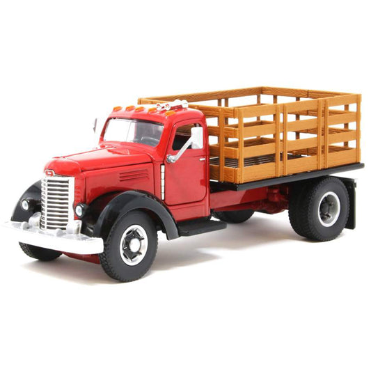 Model of an old-fashioned international kb-8 red stakebed truck with a black bed on a white background