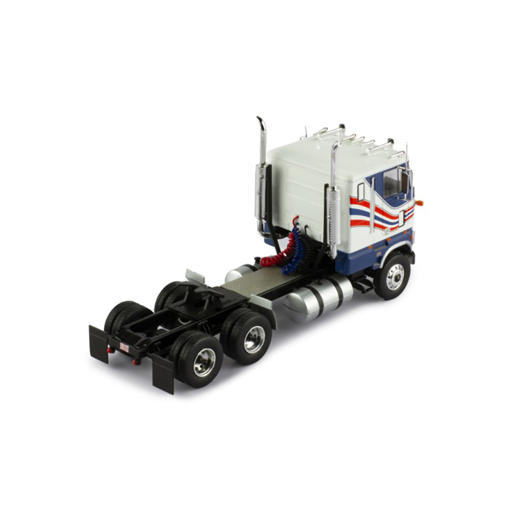 Model Ford CL 9000 truck with a blue and white color scheme on a white background