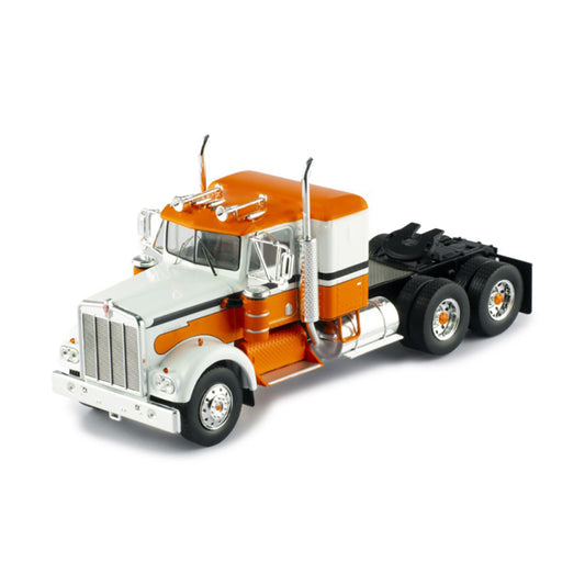 Model of a kenworth w900a orange and white truck on a white background
