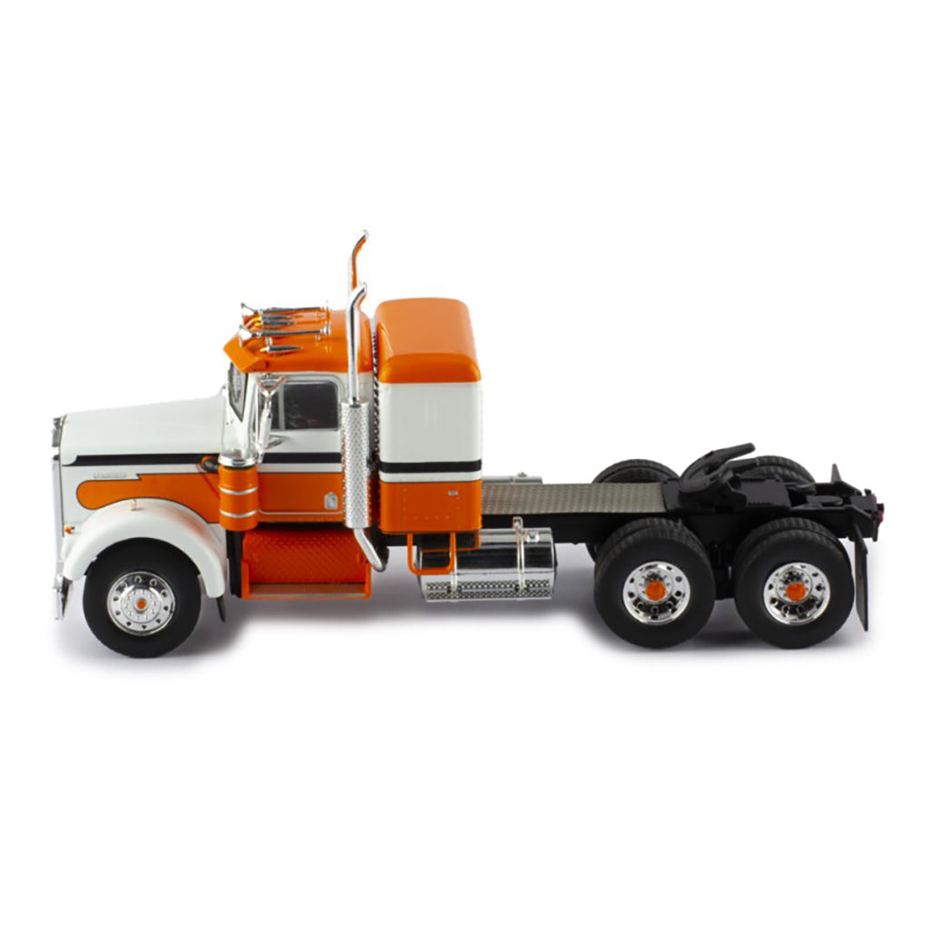 Model of a kenworth w900a orange and white truck on a white background