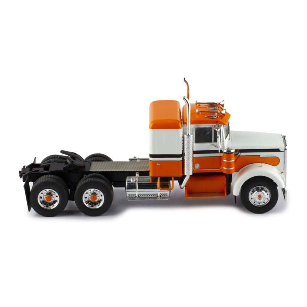 Model of a kenworth w900a orange and white truck on a white background