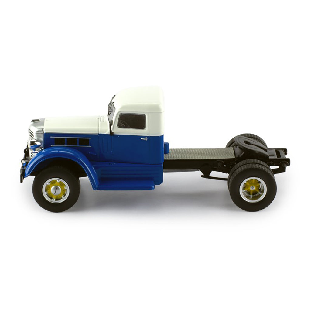 Model of a blue and white Federal truck on a white background