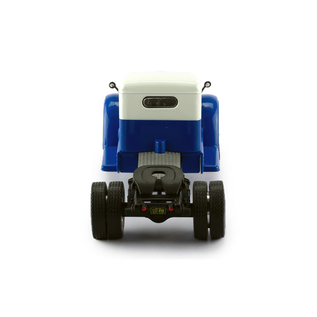 Model of a blue and white Federal truck on a white background