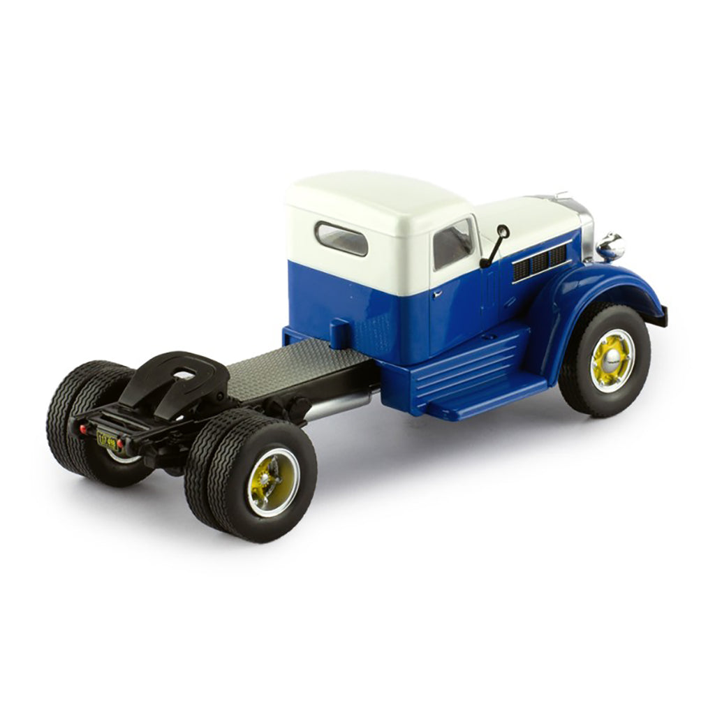 Model of a blue and white Federal truck on a white background