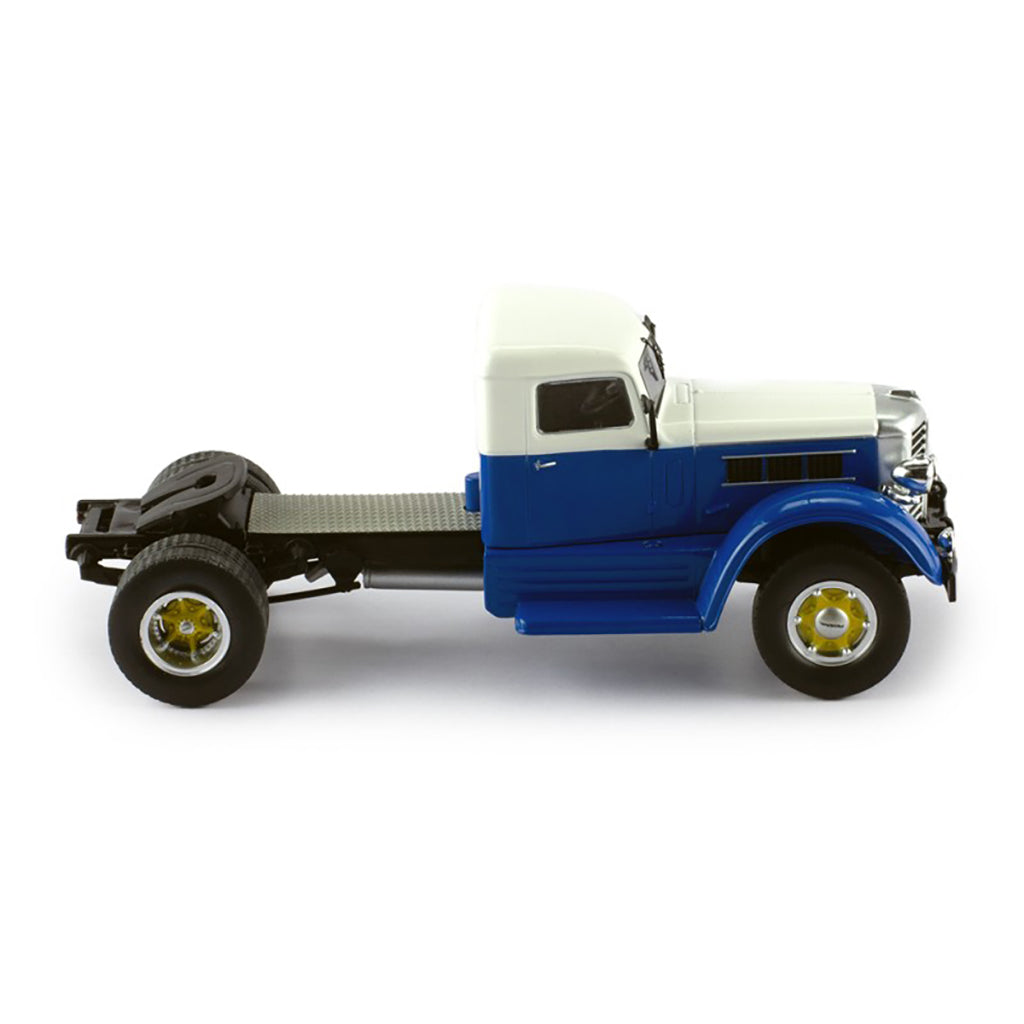 Model of a blue and white Federal truck on a white background