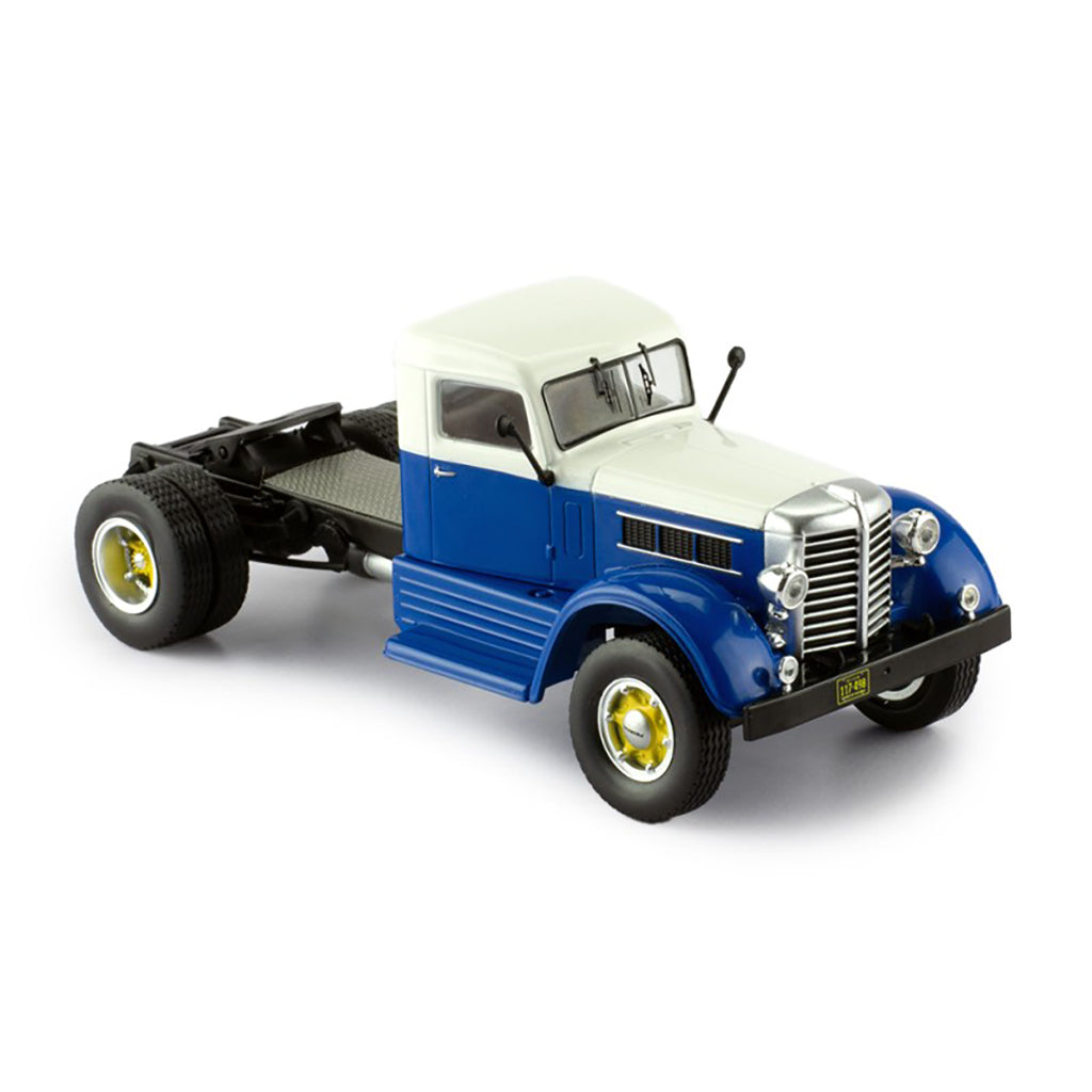 Model of a blue and white Federal truck on a white background