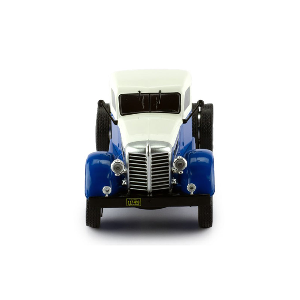 Model of a blue and white Federal truck on a white background