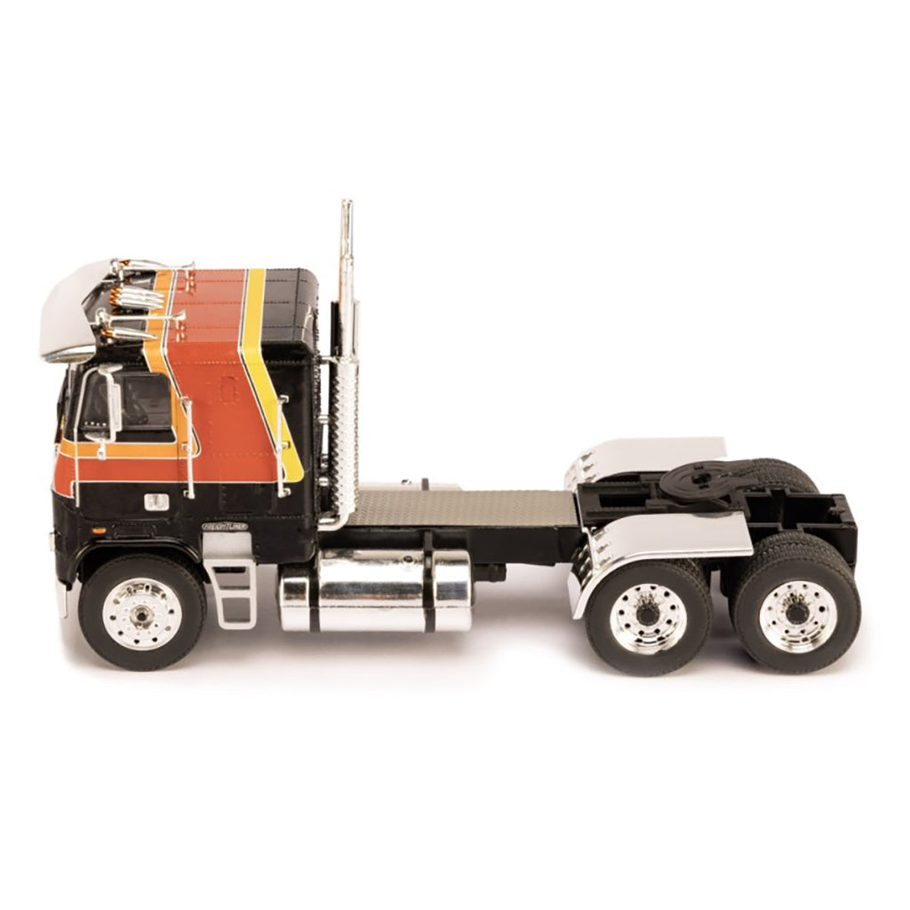 Model of a Freightliner FLA semi-truck on a white background