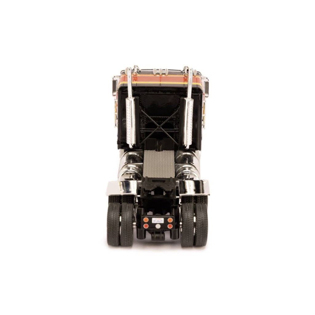 Model of a Freightliner FLA semi-truck on a white background