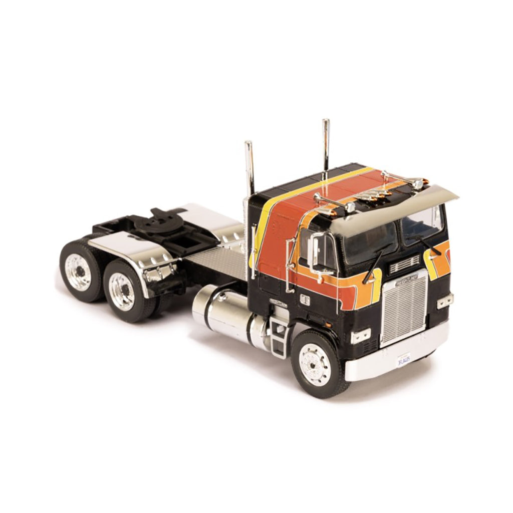 Model of a Freightliner FLA semi-truck on a white background