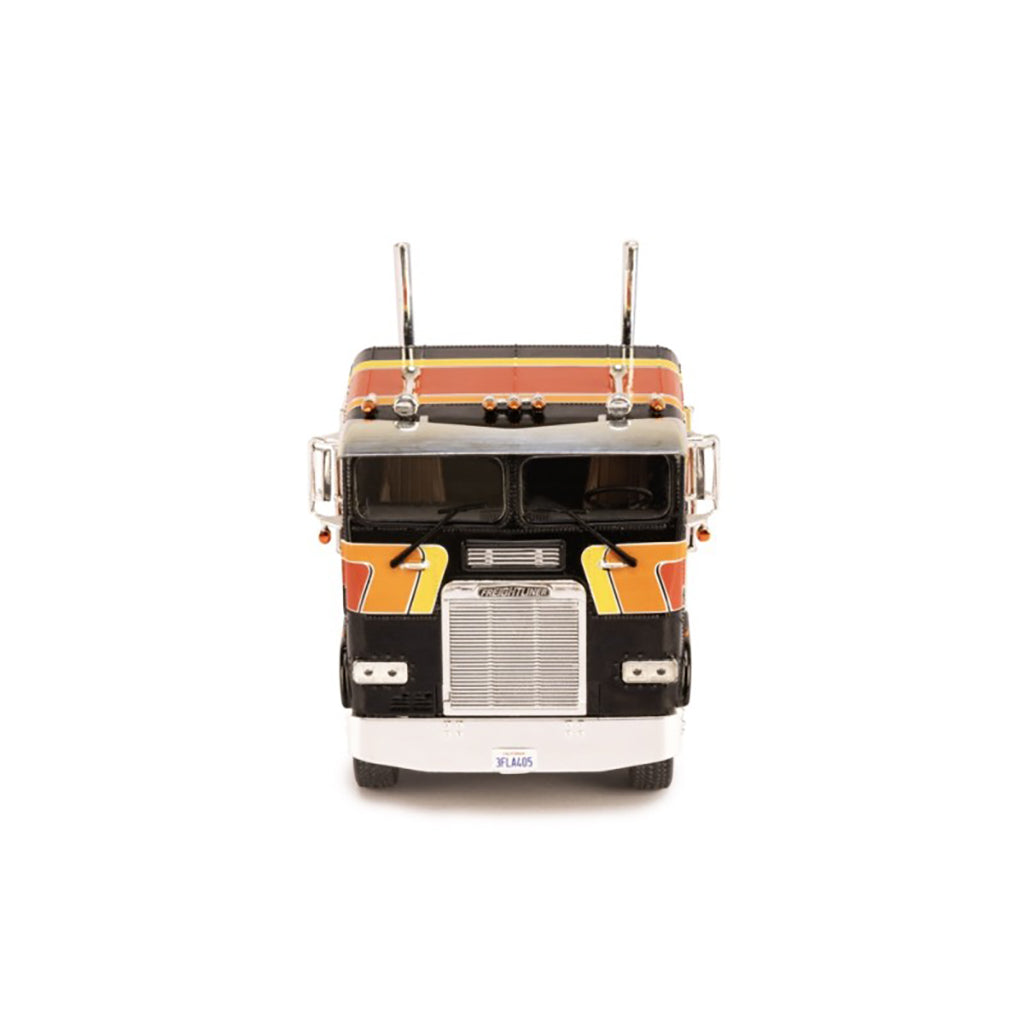 Model of a Freightliner FLA semi-truck on a white background