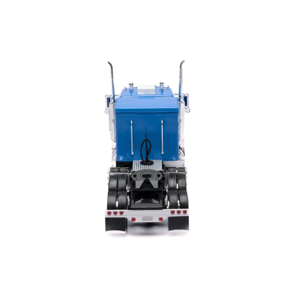 Blue toy Marmon truck on a white background