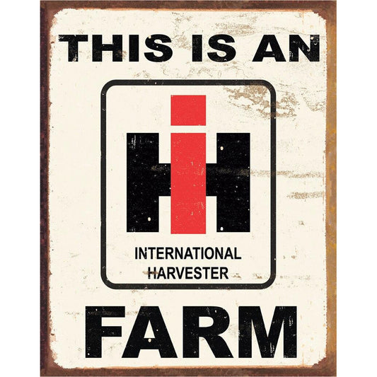 Vintage-style sign with International Harvester logo and text on a white background