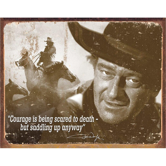 Vintage-style metal sign with a cowboy and a quote about courage.