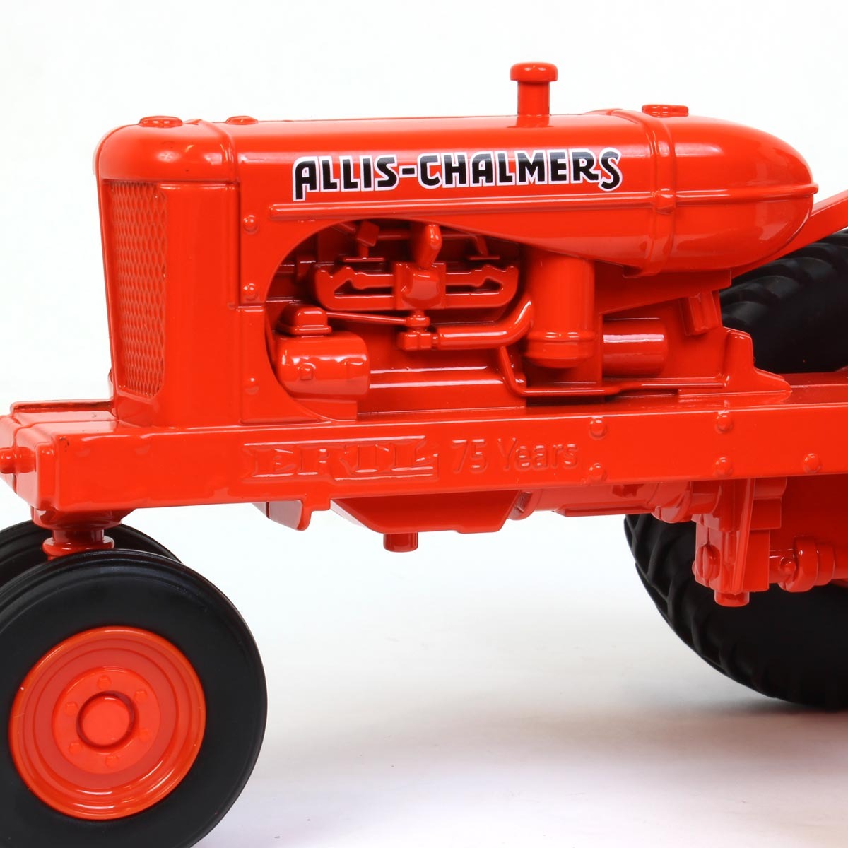 Orange Allis-Chalmers tractor model on a white background