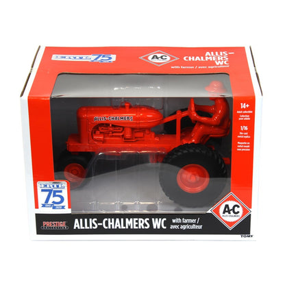 Orange toy tractor in a box with Allis-Chalmers branding on a white background