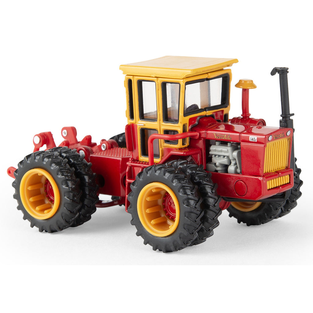 Vintage Versatile toy tractor, on a white background
